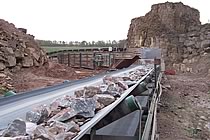 Horizontal conveyors carrying stone through the quarry.